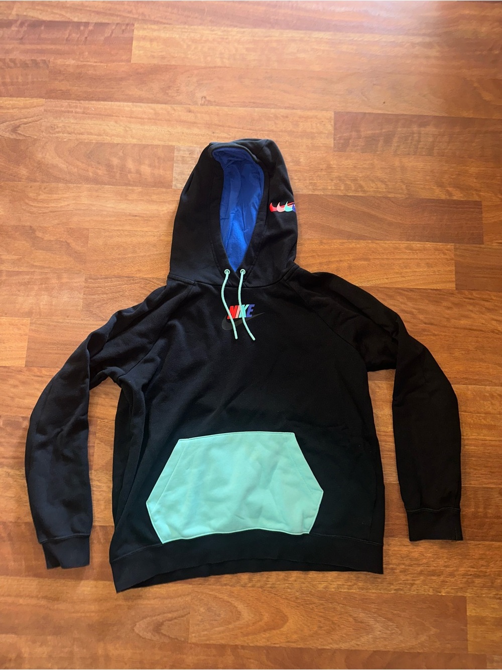 Nike Kid’s Black Hoodie with Aqua Pocket and Blue Hood Lining